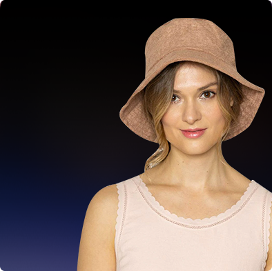 A woman is wearing brown bucket hat.